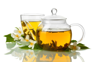 green tea with jasmine in cup and teapot isolated on white