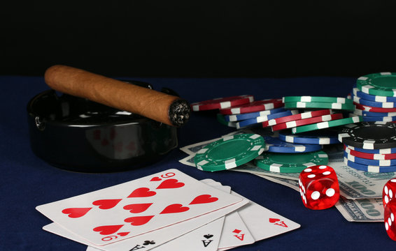 playing cards and poker chips on table