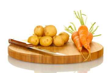 young vegetables on table isolated on white 