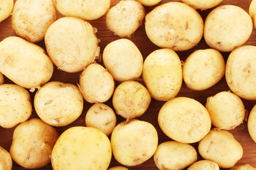 young potatoes on table  