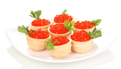 Red caviar in tartlets on white plate isolated on white