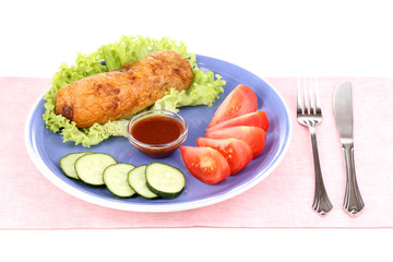 Tasty meat cutlet with garnish on plate