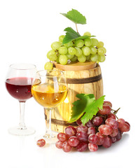 barrel and glasses of wine and ripe grapes isolated on white