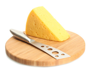 tasty cheese and knife on wooden cutting board isolated on white