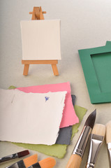 Blank art board, blank paper and brashes
