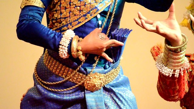 close up of aspara dancers dancing