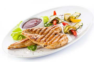 Grilled chicken breasts and vegetables