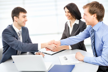 Business people shaking hands