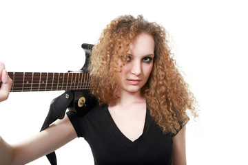 curly-haired girl with a guitar isolated