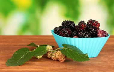 Bright silicone cutter with ripe mulberry