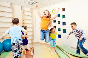 children enjoying gym class - 42231303