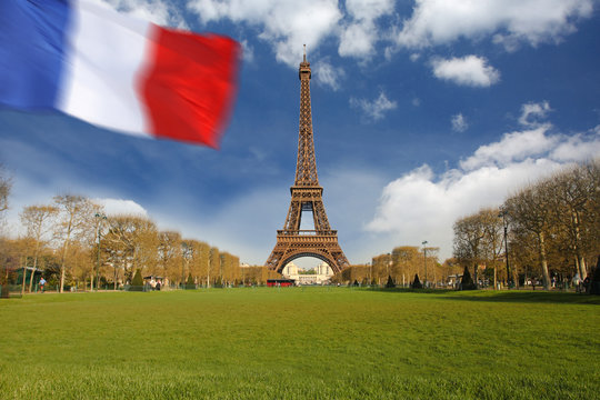 Fototapeta Eiffel Tower with flag of  France in Paris