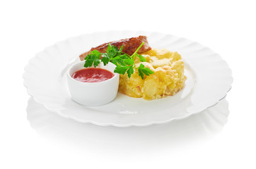Grilled meat with trimmings isolated on a white background