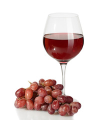 glass of wine and ripe grapes isolated on white