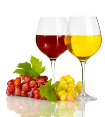 glasses of wine and ripe grapes isolated on white