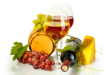 barrel, bottle and glasses of wine, cheese and ripe grapes