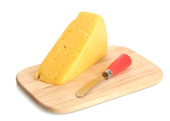 tasty cheese and knife on wooden cutting board isolated on