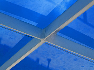 abstract metal construction covered with blue material, industry