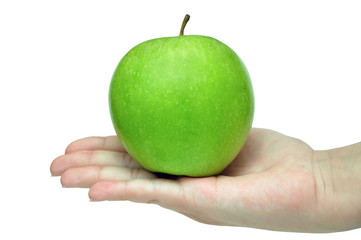 green apple on a female hand