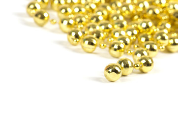 Background made of a brilliant celebratory beads of golden color