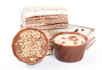 Chocolate and nuts over white