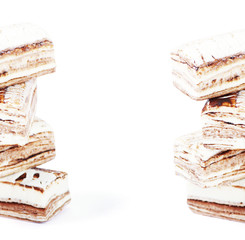 Few pieces of nougat stacked together on white