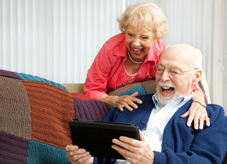 Tablet PC - Senior Couple Laughing