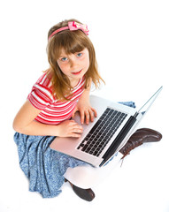 young girl using notebook computer