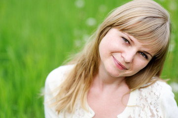 Close-up portrait of beautiful young blond woman