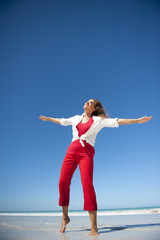 Fototapeta premium Happy, positive, optimistic woman at beach
