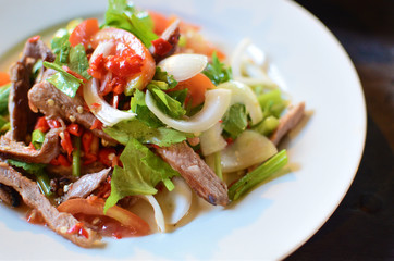 Spicy pork salad with vegetables