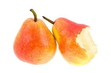 The whole pear and the bitten-off pear.