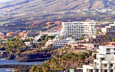 Fototapeta na wymiar Modern hotels on Playa de Las Americas, Tenerife,Spain
