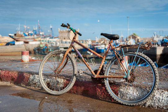 Rusty bike in the fishing port Essaouira Morocco