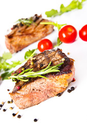 Beef steak medium grilled, isolated on white background