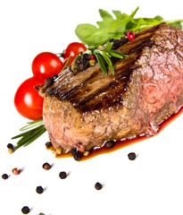Beef steak medium grilled, isolated on white background