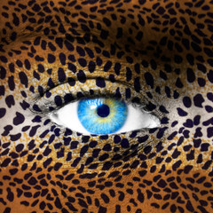 Human face with animal patterns - Endangered species concept