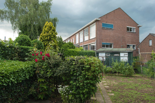 School behind a garden in spring