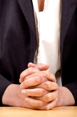 woman holding hands folded for prayer