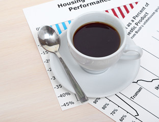 Accounting. Cup of coffee on document. chart and diagram
