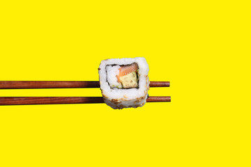 Californian roll on chopsticks