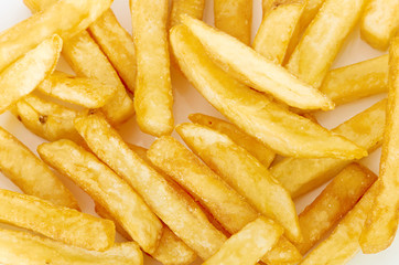 a pile of french fries on a white background