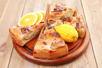 sweet food : apple pie cuts served with apples and lemon