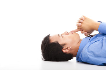 business man lying on floor with thinking