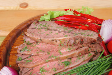 beef on wooden plate