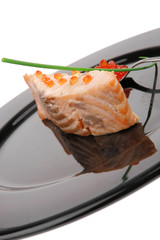 roasted salmon fillet with red caviar in spoon