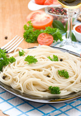 spaghetti food and vegetables spices on wood