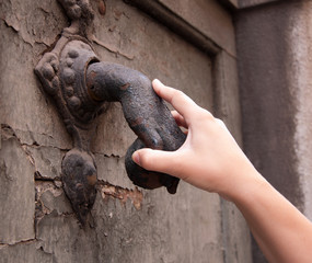 hand holding the knocker