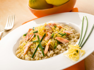 risotto with fresh salmon chive and lemon peel, healthy food