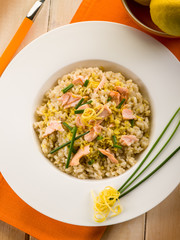 risotto with fresh salmon chive and lemon peel, healthy food